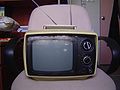 https://upload.wikimedia.org/wikipedia/commons/thumb/7/78/Early_portable_tv.jpg/120px-Early_portable_tv.jpg