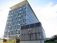 https://upload.wikimedia.org/wikipedia/commons/thumb/2/2e/WHO_HQ_main_building%2C_Geneva%2C_from_North.JPG/220px-WHO_HQ_main_building%2C_Geneva%2C_from_North.JPG