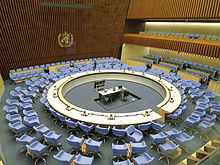 https://upload.wikimedia.org/wikipedia/commons/thumb/f/f8/World_Health_Organization_Executive_Board_Room.JPG/220px-World_Health_Organization_Executive_Board_Room.JPG